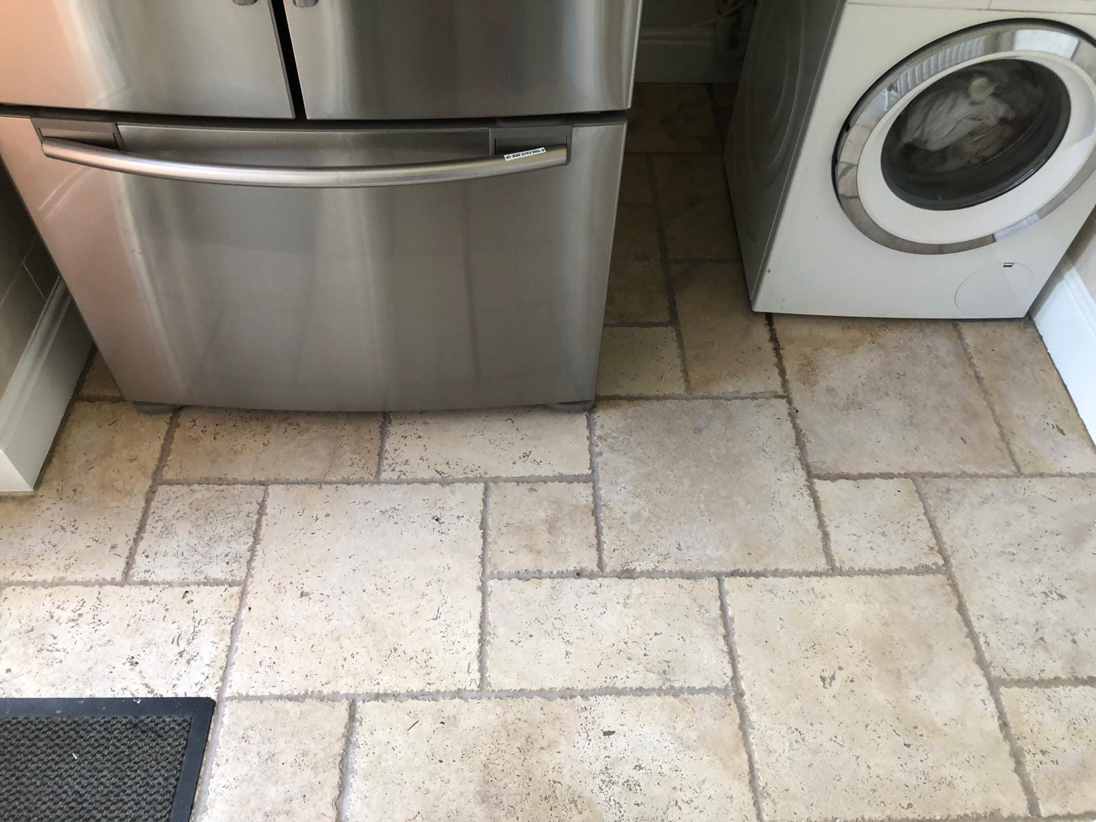 Travertine Utility Floor Before Cleaning Bolton